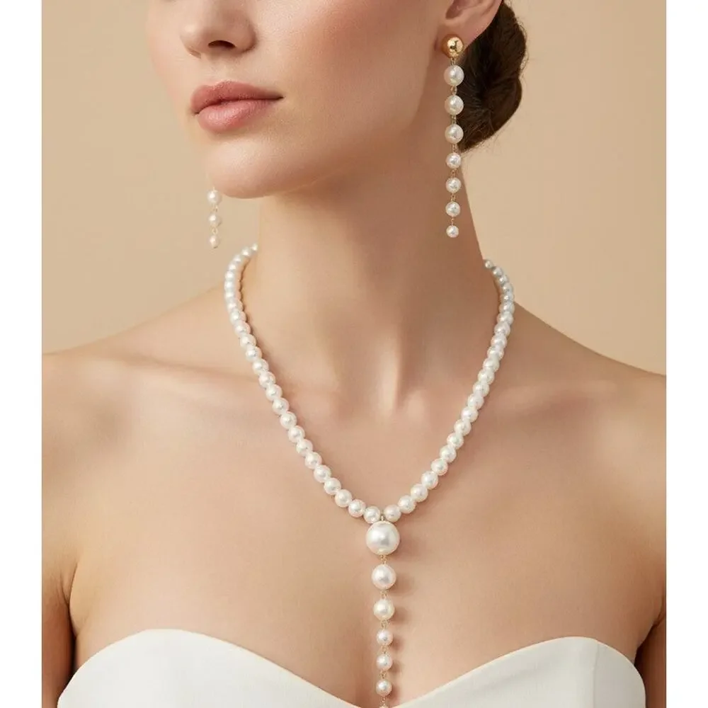 Clip on gold and white pearl necklace and earring set